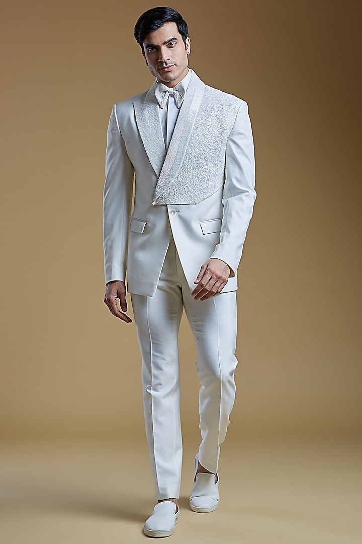 White Terry Wool Cutdana Hand Embroidered Asymmetric Tuxedo Set by PURUSHAM