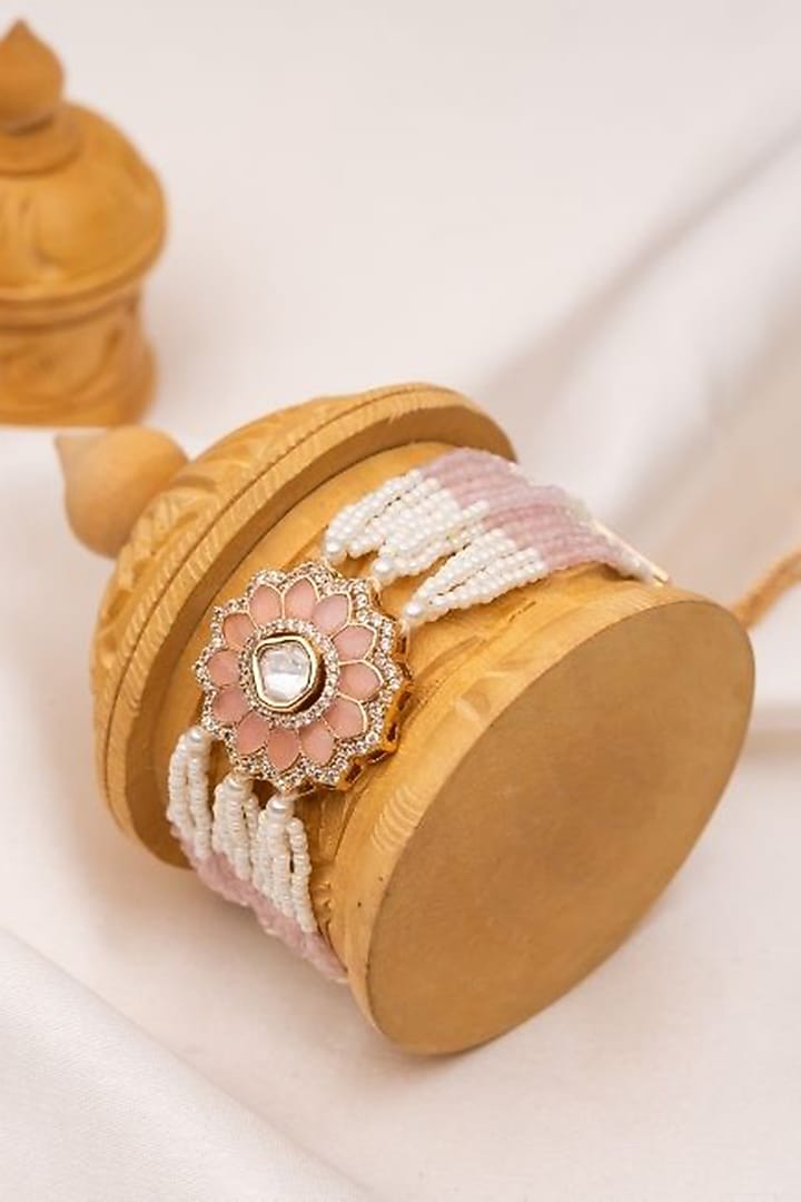 Gold Plated Kundan Polki Motif & Pink Pearl Adjustable Bracelet by PUTSTYLE at Pernia's Pop Up Shop