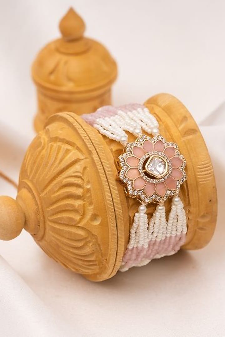 Gold Plated Kundan Polki Motif & Pink Pearl Adjustable Bracelet by PUTSTYLE at Pernia's Pop Up Shop