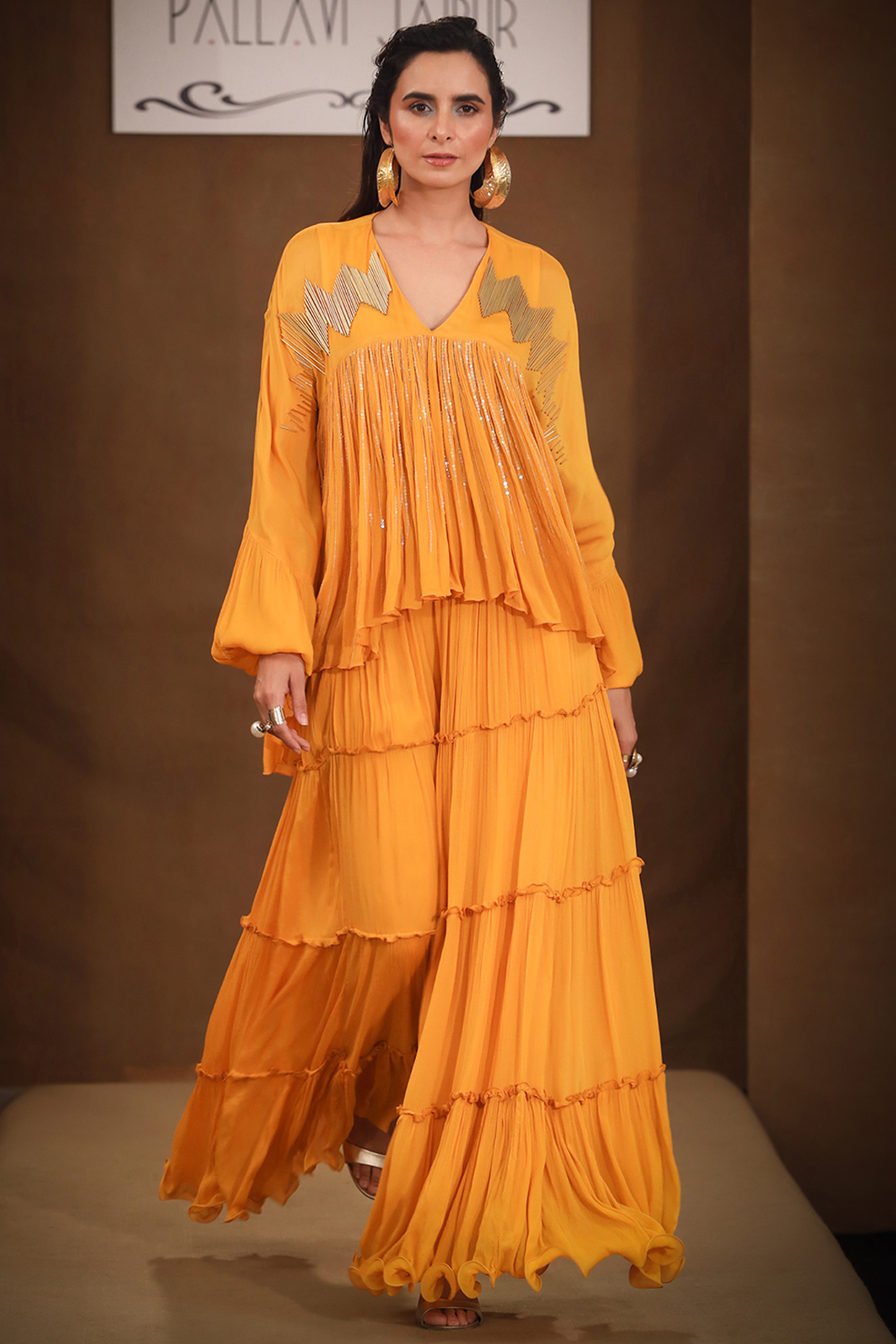 Turmeric Yellow Tiered Party Wear Sharara Set by Pallavi Jaipur at Pernia's Pop Up Shop