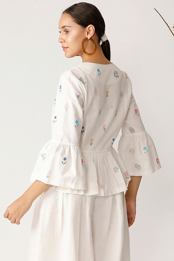 White Embroidered Peplum Top by Payal Pratap at Pernia's Pop Up Shop