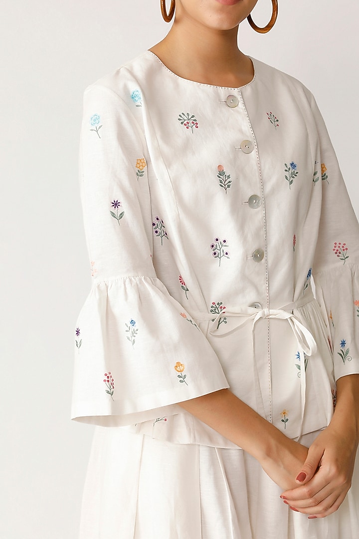 White Embroidered Peplum Top by Payal Pratap at Pernia's Pop Up Shop