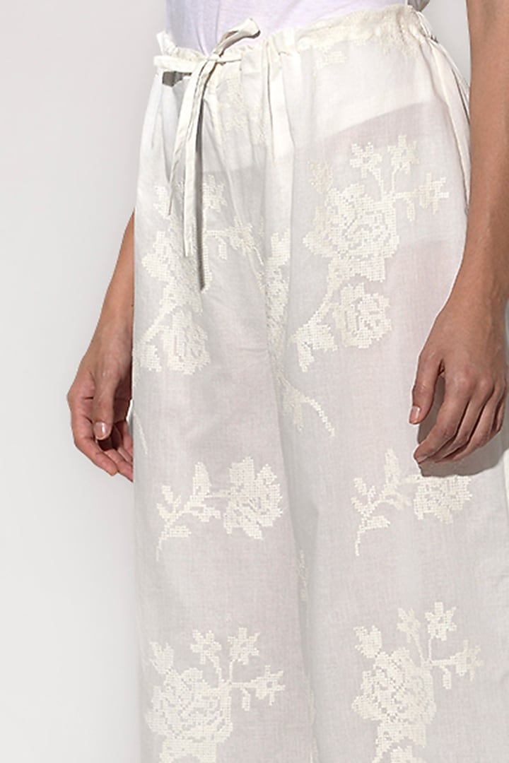 White Embroidered Pants by Umbar by Payal Pratap at Pernia's Pop Up Shop