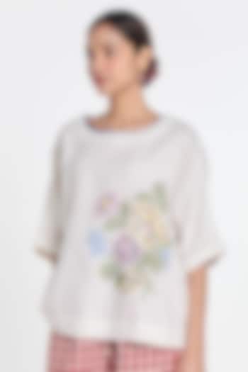 Ivory Handloom Linen Floral Embroidered Top by Payal Pratap at Pernia's Pop Up Shop