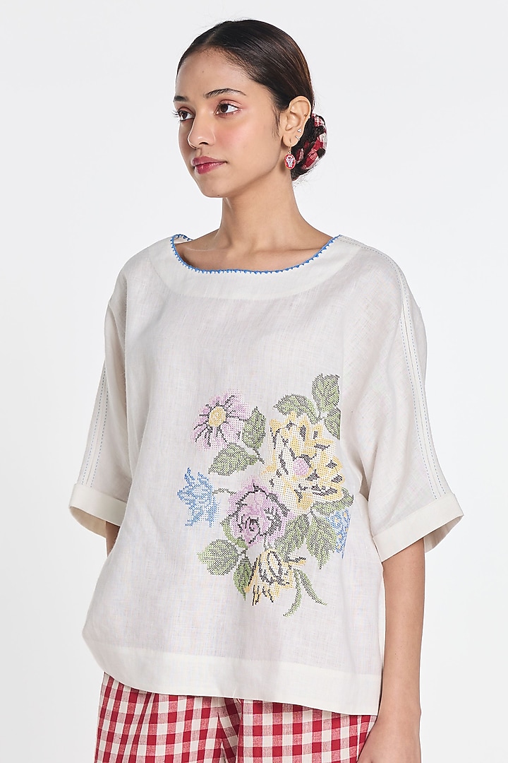 Ivory Handloom Linen Floral Embroidered Top by Payal Pratap at Pernia's Pop Up Shop