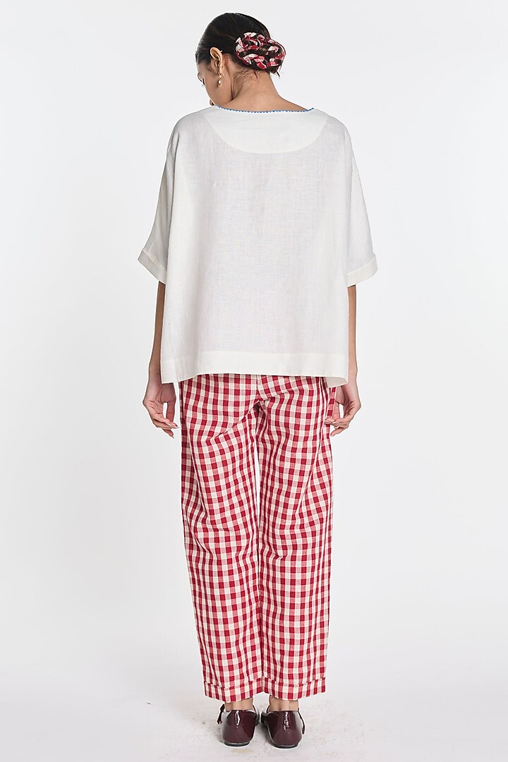 Ivory Handloom Linen Floral Embroidered Top by Payal Pratap at Pernia's Pop Up Shop