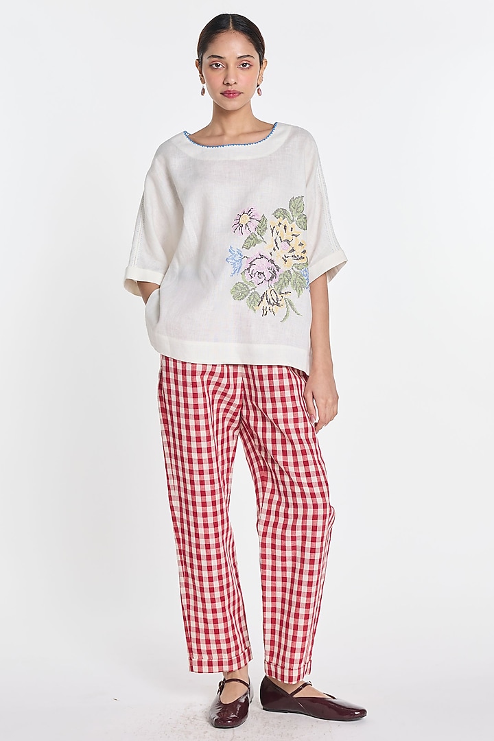 Ivory Handloom Linen Floral Embroidered Top by Payal Pratap at Pernia's Pop Up Shop