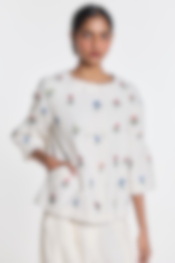 Ivory Denim Floral Embroidered Peplum Jacket by Payal Pratap at Pernia's Pop Up Shop