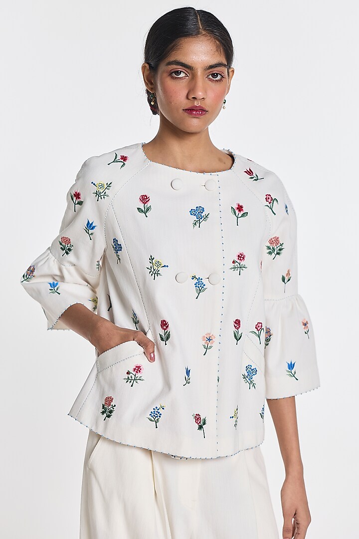 Ivory Denim Floral Embroidered Peplum Jacket by Payal Pratap at Pernia's Pop Up Shop