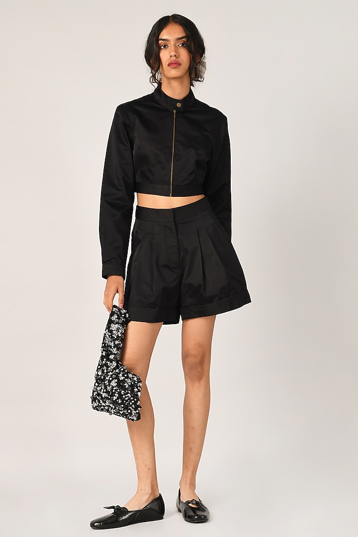 Black Duchess Satin Pleated Shorts by Payal Pratap at Pernia's Pop Up Shop