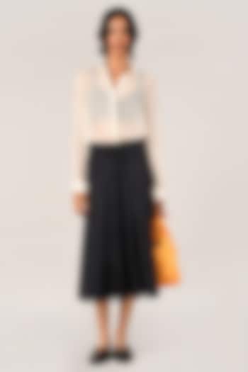 Black Duchess Satin Pleated Skirt by Payal Pratap at Pernia's Pop Up Shop