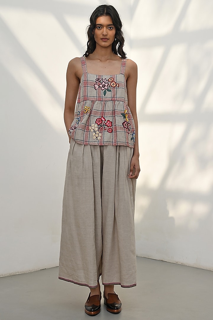 Beige Handloom Linen Floral Thread Embroidered Peplum Top by Payal Pratap at Pernia's Pop Up Shop