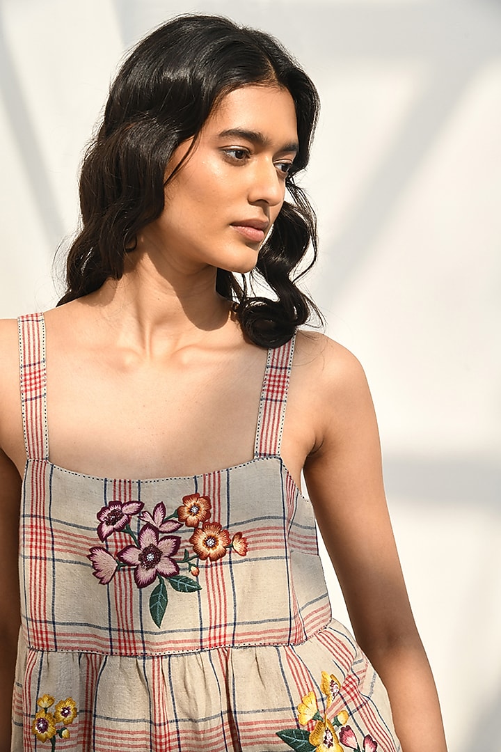 Beige Handloom Linen Floral Thread Embroidered Peplum Top by Payal Pratap at Pernia's Pop Up Shop