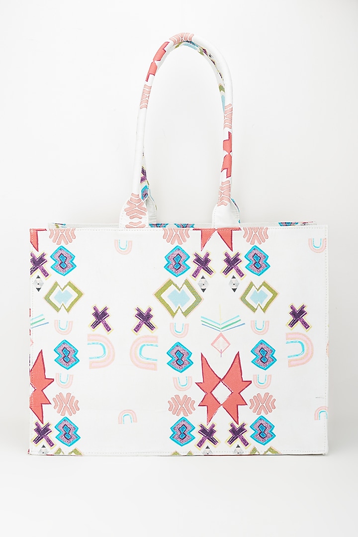 White Ikat Printed Tote Bag by PAYAL SINGHAL ACCESSORIES at Pernia's Pop Up Shop