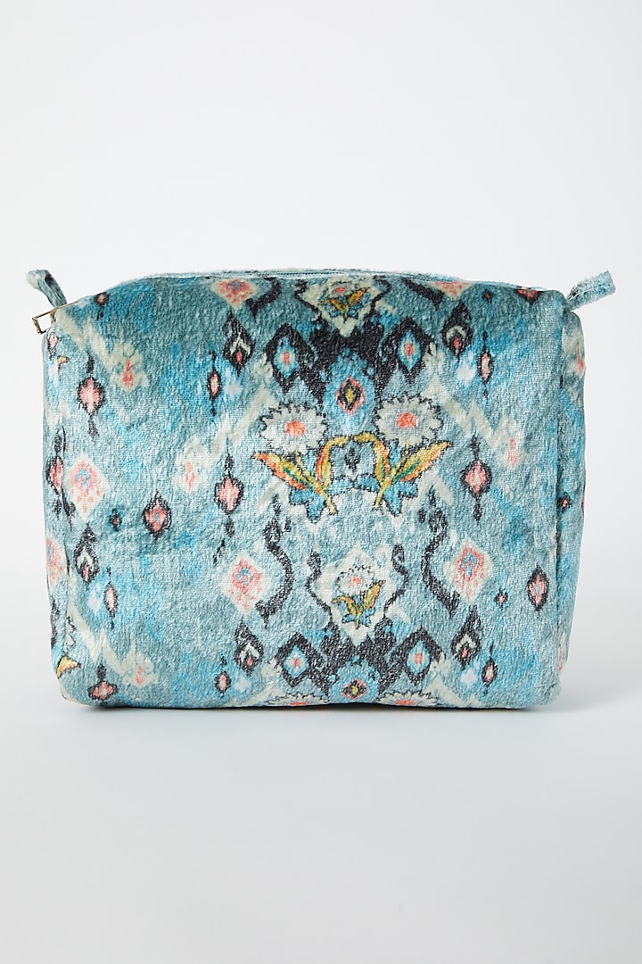 Blue Ikat Printed Velvet Pouch by PAYAL SINGHAL ACCESSORIES