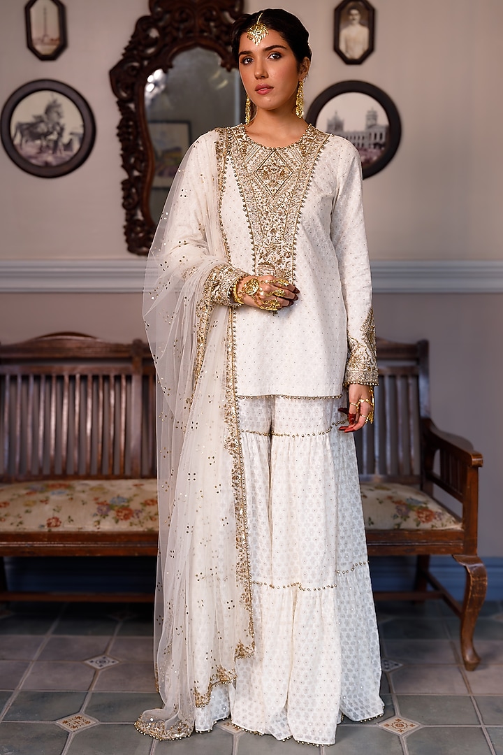 Off-White Katarwa Frilled Bridal Sharara Set by Payal Singhal at Pernia's Pop Up Shop
