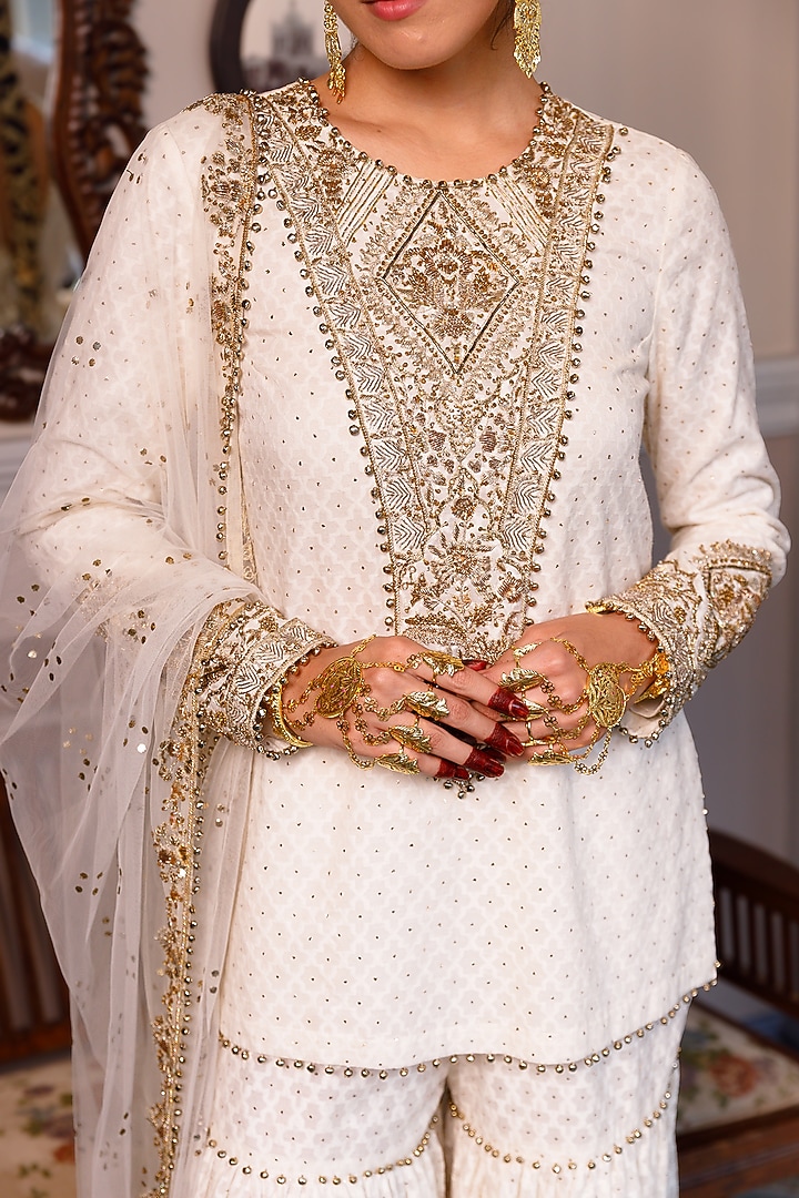 Off-White Katarwa Frilled Bridal Sharara Set by Payal Singhal at Pernia's Pop Up Shop