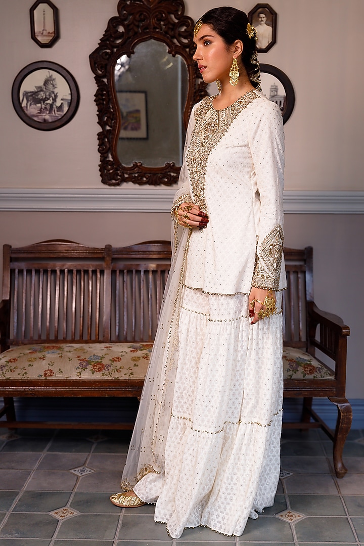 Off-White Katarwa Frilled Bridal Sharara Set by Payal Singhal at Pernia's Pop Up Shop