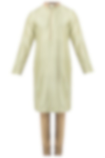 Mint green pintuck kurta with churidaar pants available only at Pernia's Pop Up Shop.