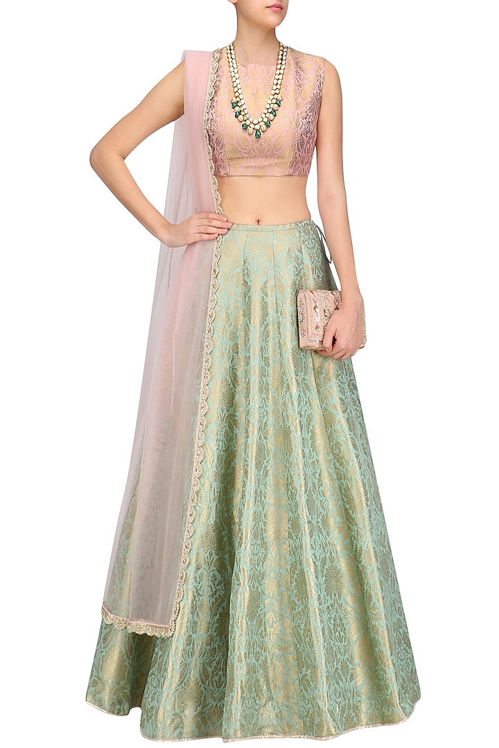 Dusky rose and mint brocade lehenga set available only at Pernia's Pop Up Shop.