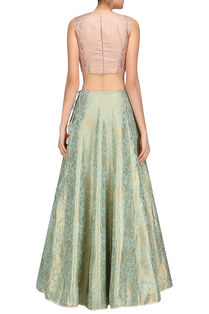 Dusky rose and mint brocade lehenga set available only at Pernia's Pop Up Shop.