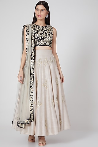 Black and stone color nagmeh style lehenga set by Payal Singhal