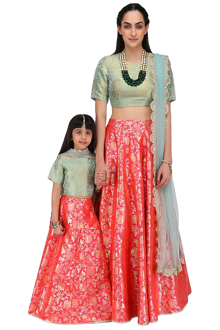 Mother and Daughter Mint and Hot Pink Brocade Lehenga Set by Payal Singhal
