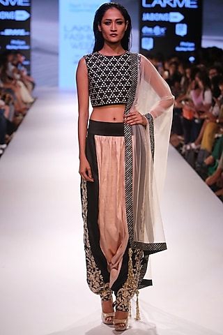 Black embroidered crop top with blush and black low crotch embellished dhoti pants by Payal Singhal