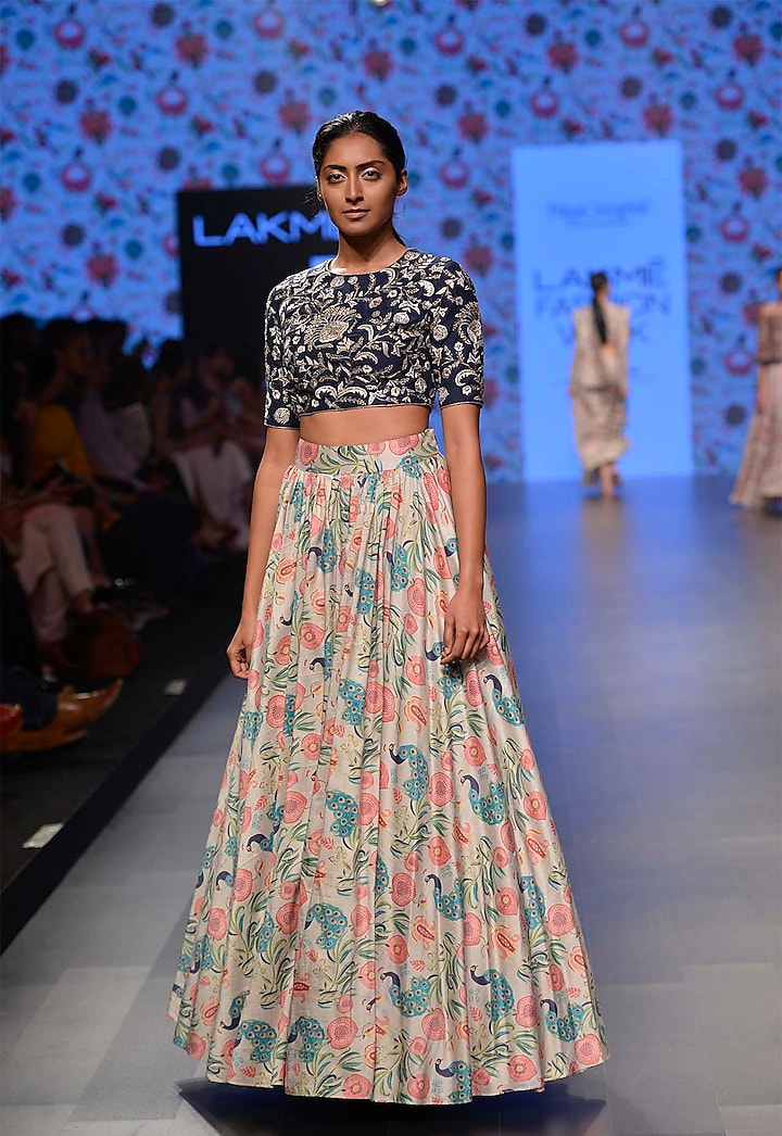 Navy blue dupion silk blouse with khaki color flared skirt by Payal Singhal