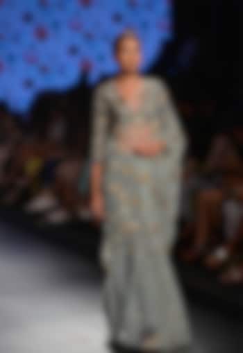 Powder blue saree with navy blue floral applique blouse available only at Pernia's Pop Up Shop.