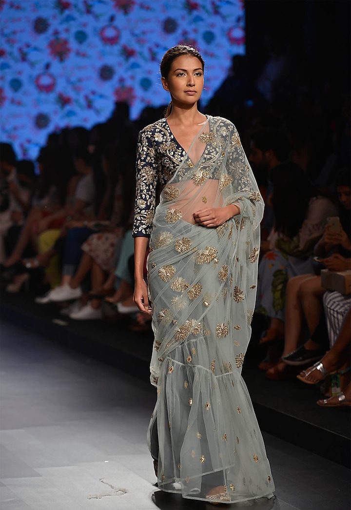 Powder Blue Net Floral Embroidered Saree Set by Payal Singhal