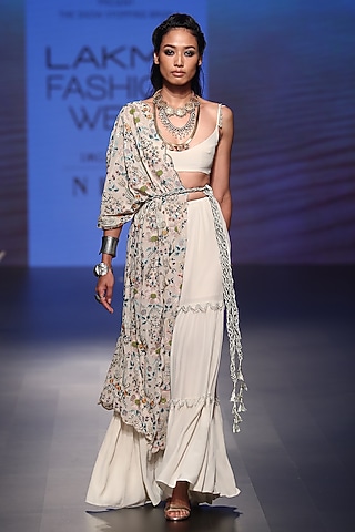 Stone embroidered sharara set with jacket and belt by Payal Singhal