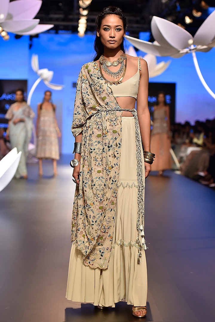 Stone embroidered sharara set with jacket and belt by Payal Singhal