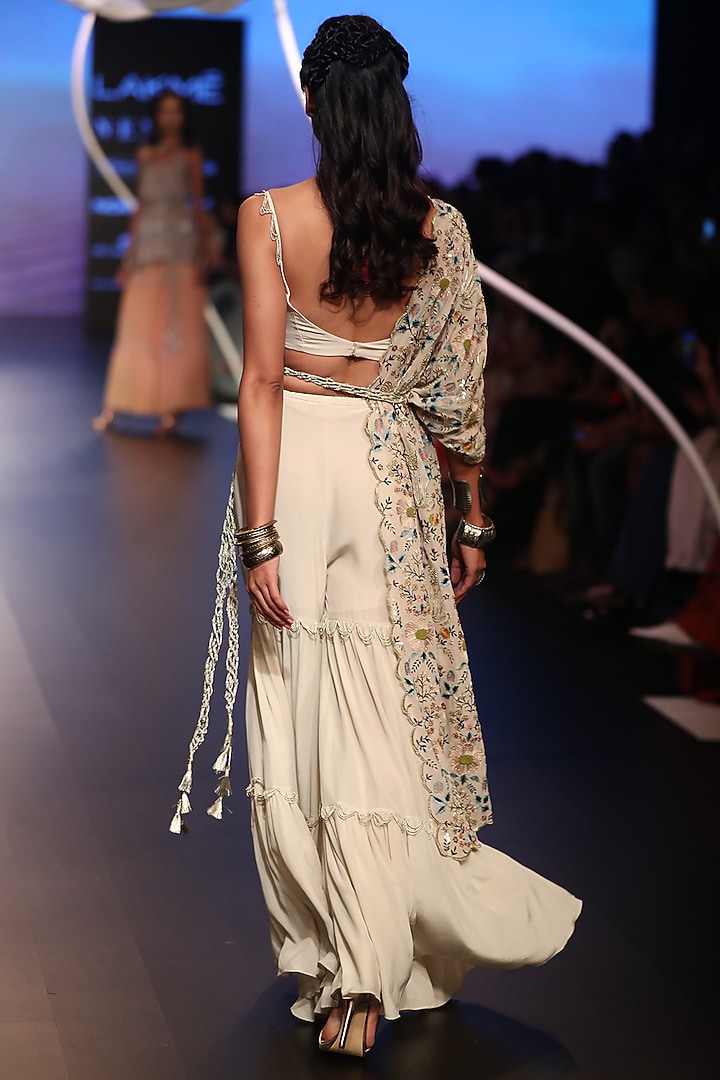 Stone embroidered sharara set with jacket and belt available only at Pernia's Pop Up Shop.