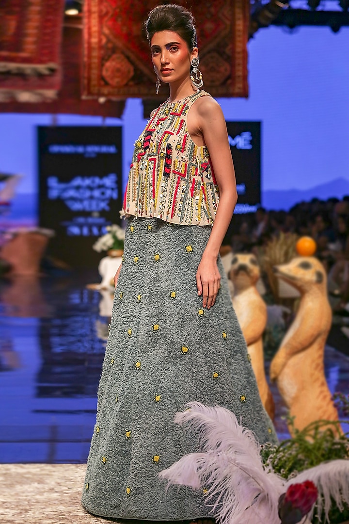 Multi Colored Embroidered Blouse With Periwinkle Blue Textured Lehenga Skirt by Payal Singhal