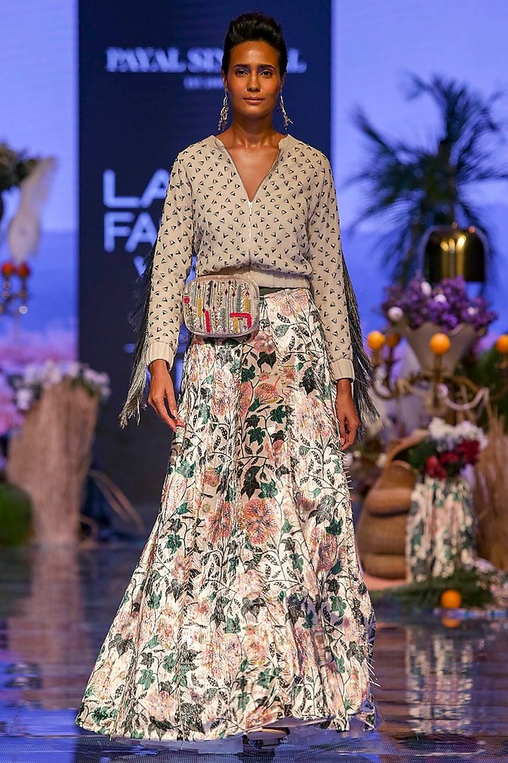 Chalk White Embroidered Bomber Jacket With Printed Lehenga Skirt by Payal Singhal