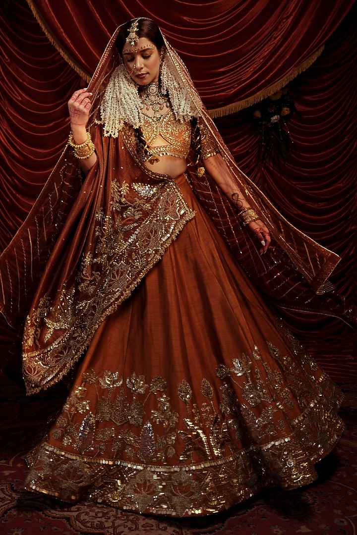 Brown Raw Silk Sequins Embroidered Bridal Lehenga Set by Payal & Zinal at Pernia's Pop Up Shop