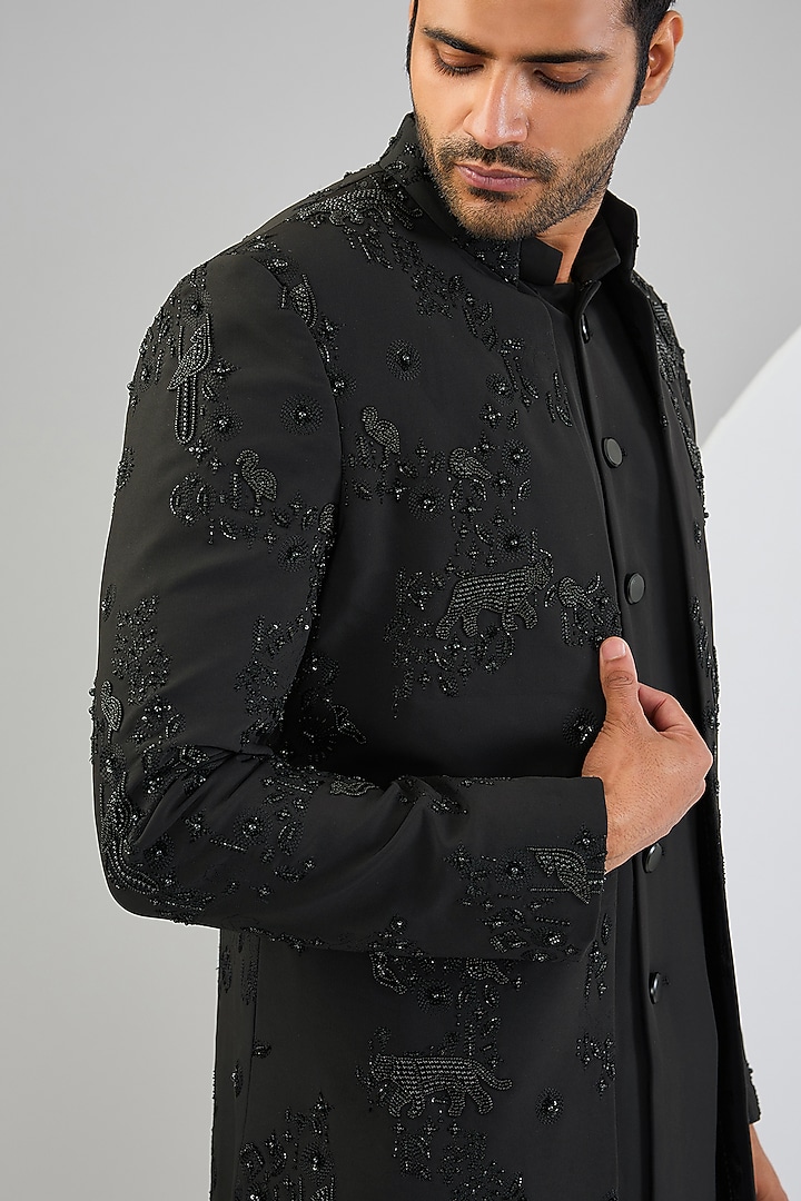 Black Viscose Suiting Knit Embroidered Groom Indowestern Set by Qbik Men at Pernia's Pop Up Shop