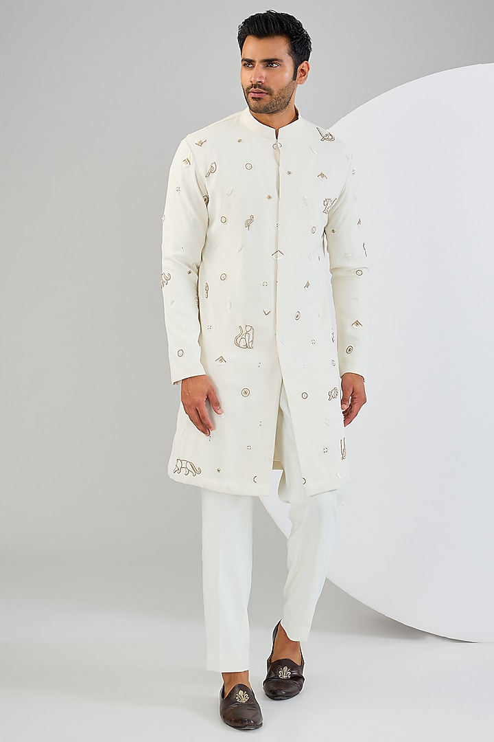 Ivory Viscose Suiting Knit Motifs Embroidered Kurta Set by Qbik Men