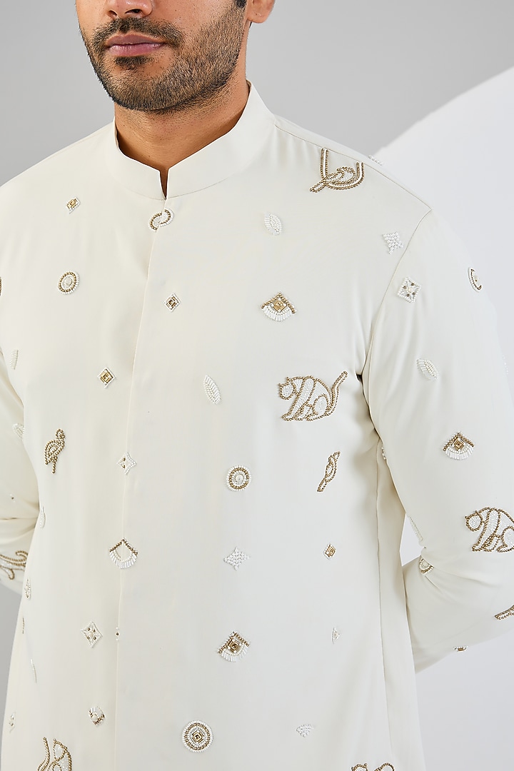 Ivory Viscose Suiting Knit Motifs Embroidered Kurta Set by Qbik Men at Pernia's Pop Up Shop