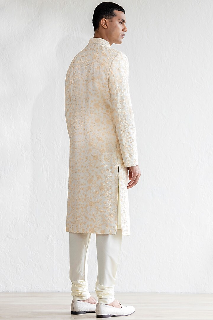 Ivory Raw Silk Embroidered Groom Sherwani Set by Qbik Men at Pernia's Pop Up Shop