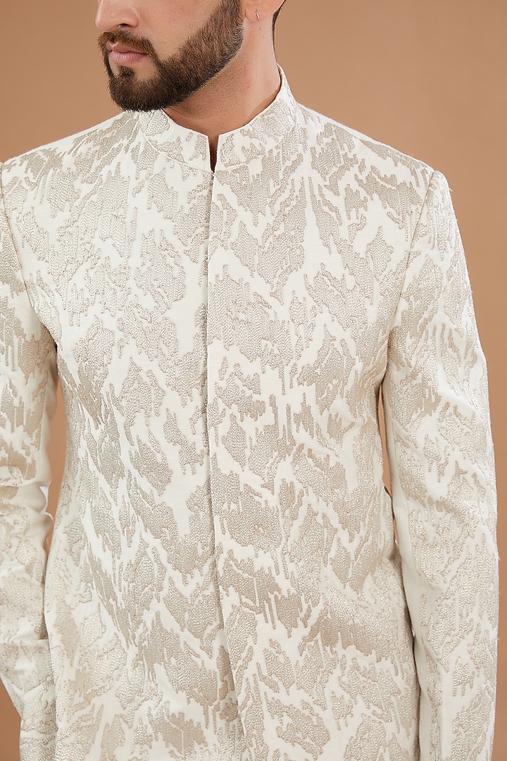 Ivory Raw Silk Zari Embroidered Wedding Bandhgala Set by Qbik Men at Pernia's Pop Up Shop