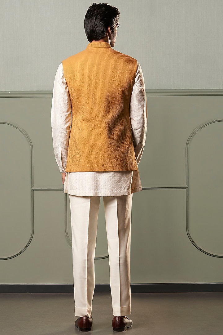 Ivory Textured Kurta Set With Mustard Nehru Jacket by Qbik Men at Pernia's Pop Up Shop