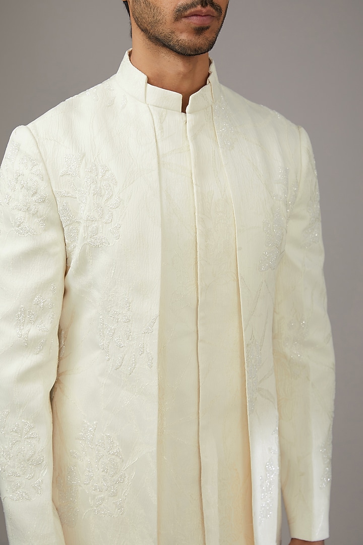 Ivory Jacquard Cutdana Embroidered Groom Indowestern Set by Qbik Men at Pernia's Pop Up Shop