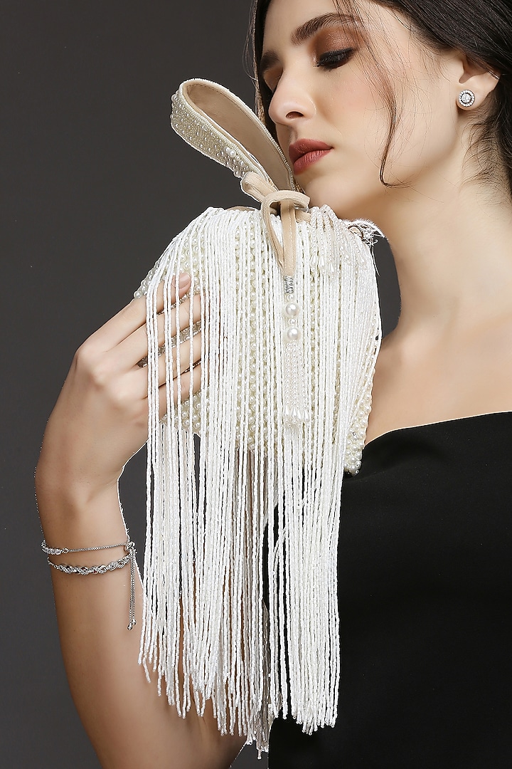 Beige Suede Embroidered Potli by Quirky Tales at Pernia's Pop Up Shop