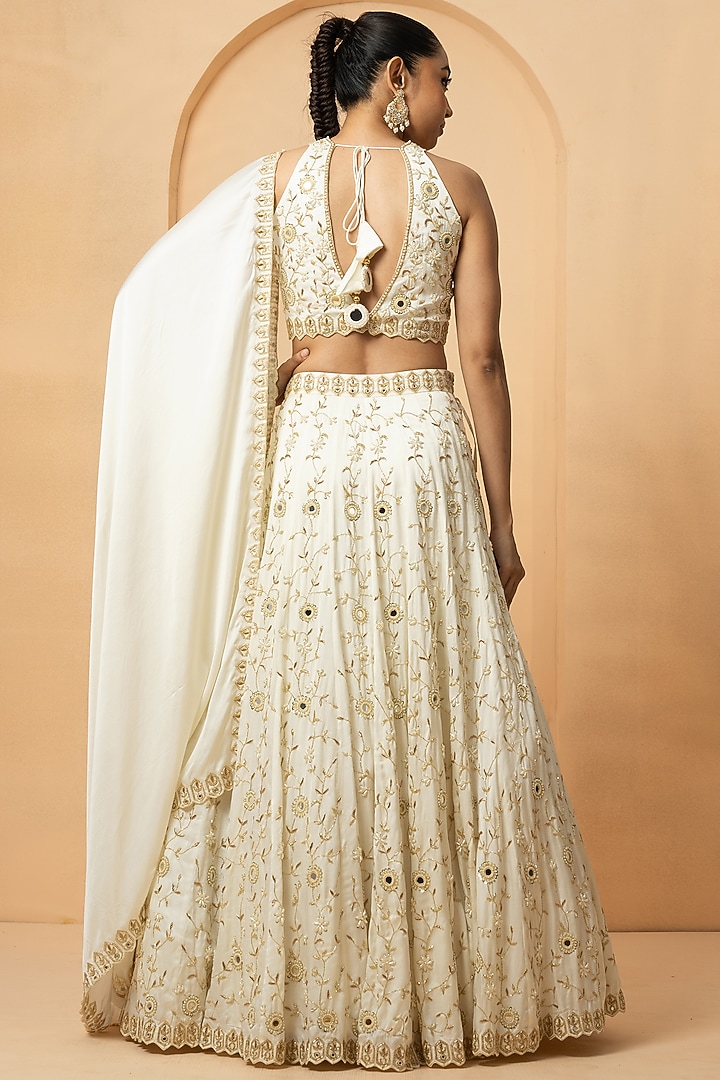 Ivory Modal Satin Mirror & Pearl Hand Embroidered Wedding Lehenga Set by Quench A Thirst at Pernia's Pop Up Shop