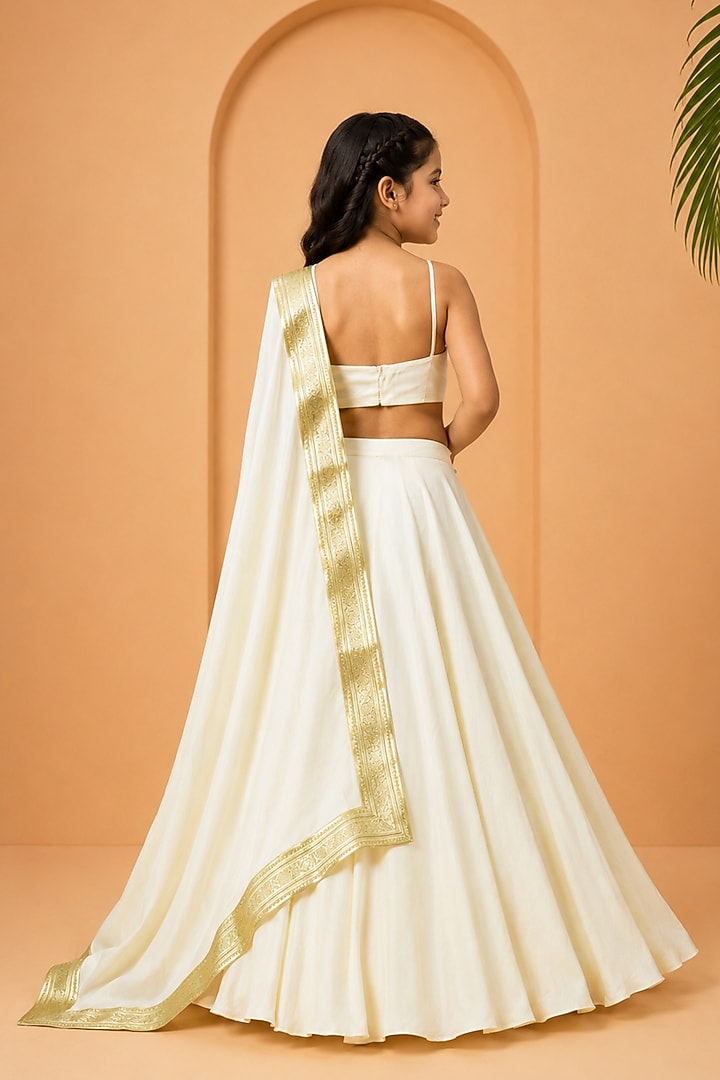 Ivory Modal Satin Lehenga Set For Girls by Quench A Thirst Kids at Pernia's Pop Up Shop