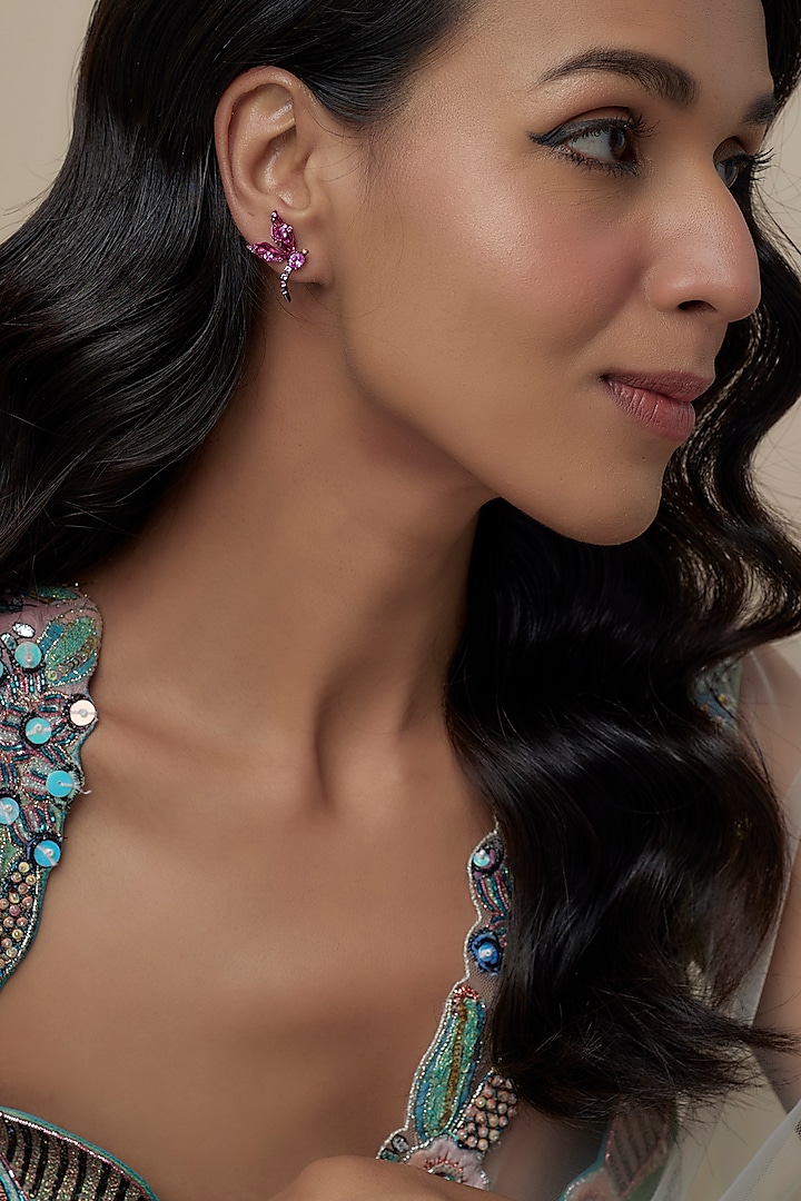 Black Rhodium Finish Pink Cubic Zirconia Dragonfly Stud Earrings In Sterling Silver by Raeesa Jewels by Sanjana and Ritu at Pernia's Pop Up Shop