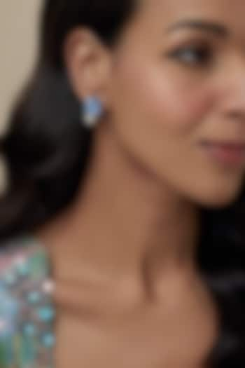 White Finish Cubic Zirconia & Aqua Stone Floral Stud Earrings In Sterling Silver by Raeesa Jewels by Sanjana and Ritu at Pernia's Pop Up Shop