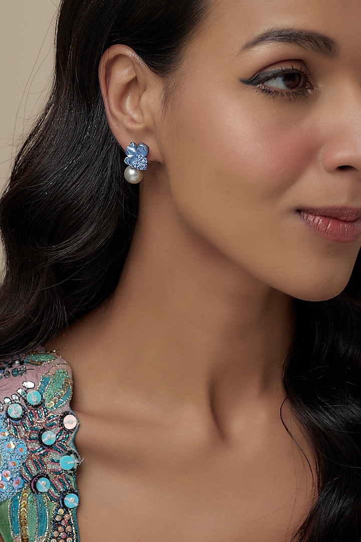 White Finish Cubic Zirconia & Aqua Stone Floral Stud Earrings In Sterling Silver by Raeesa Jewels by Sanjana and Ritu at Pernia's Pop Up Shop